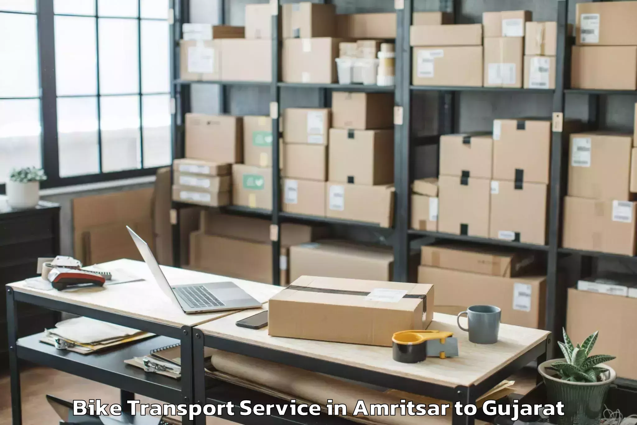 Get Amritsar to Jamjodhpur Bike Transport